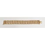 Boucheron gold and sapphire trellis-pattern bracelet, set with three rows of multiple collet set