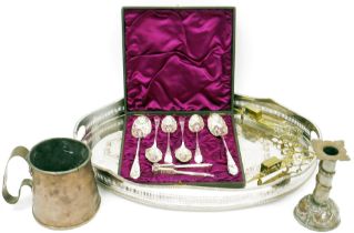 Cased set of Victorian EP spoons and nutcracker in a silk lined box; a copper mug; candlestick;