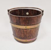 Oak and copper banded coal bucket by R A Lister & Co Ltd, Dursley, early 20th century, tapering