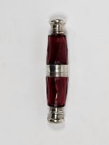 Victorian silver mounted double-ended scent flask with faceted ruby glass body, one end with