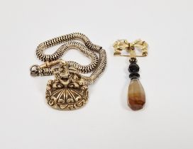 Gold-coloured metal and agate seal bow brooch, the bow suspension with banded agate cut small seal