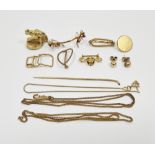 Length of gold chain (broken), sundry gold-coloured metal items, brass horse head, horseshoe