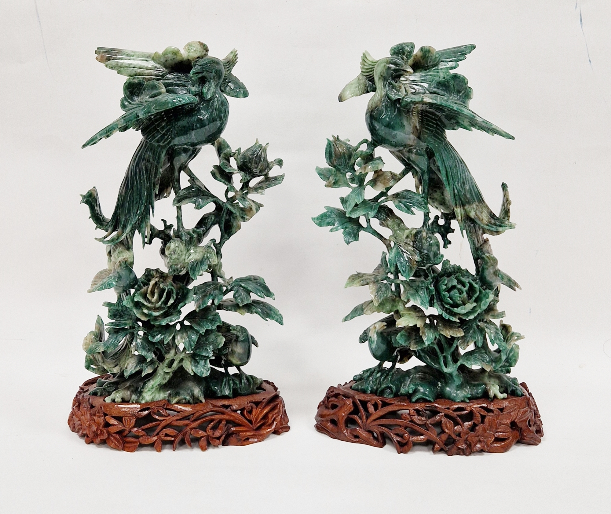 Pair of carved jadeite models of birds of paradise and other birds amidst foliage and flowers, - Image 2 of 2