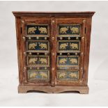 20th century stained hardwood Indian cupboard, the doors with embossed brass metal panels