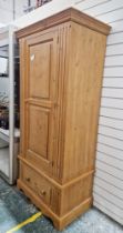 20th century pine single door wardrobe, over a single drawer, 193cm high x 88cm wide x 56cm deep