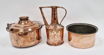 Engraved copper cooking pot and cover with swing handle, engraved with foliate ornament and