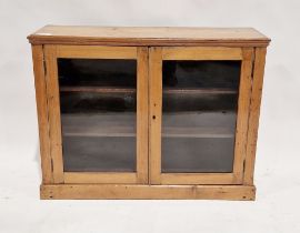 Victorian pine display cabinet, the two glazed doors opening to reveal two adjustable shelves,
