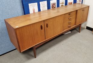 G Plan 'Brasilia' mid 20th century teak sideboard with central bank of four drawers flanked by