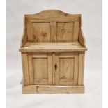 19th century pine hall seat raised over a two-door cupboard, 98cm high x 73cm wide x 42cm deep