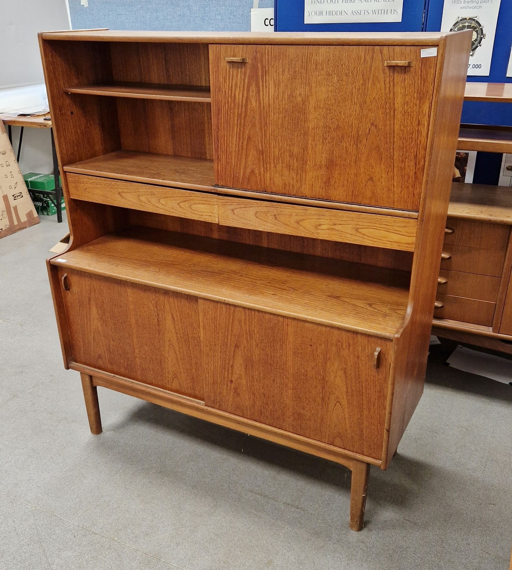 Nathan teak highboard sideboard with an open bookcase section next flanked by fall front door, above