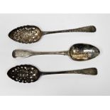 Three George III silver tablespoons, one fiddle pattern, London 1815, the other two London 1803