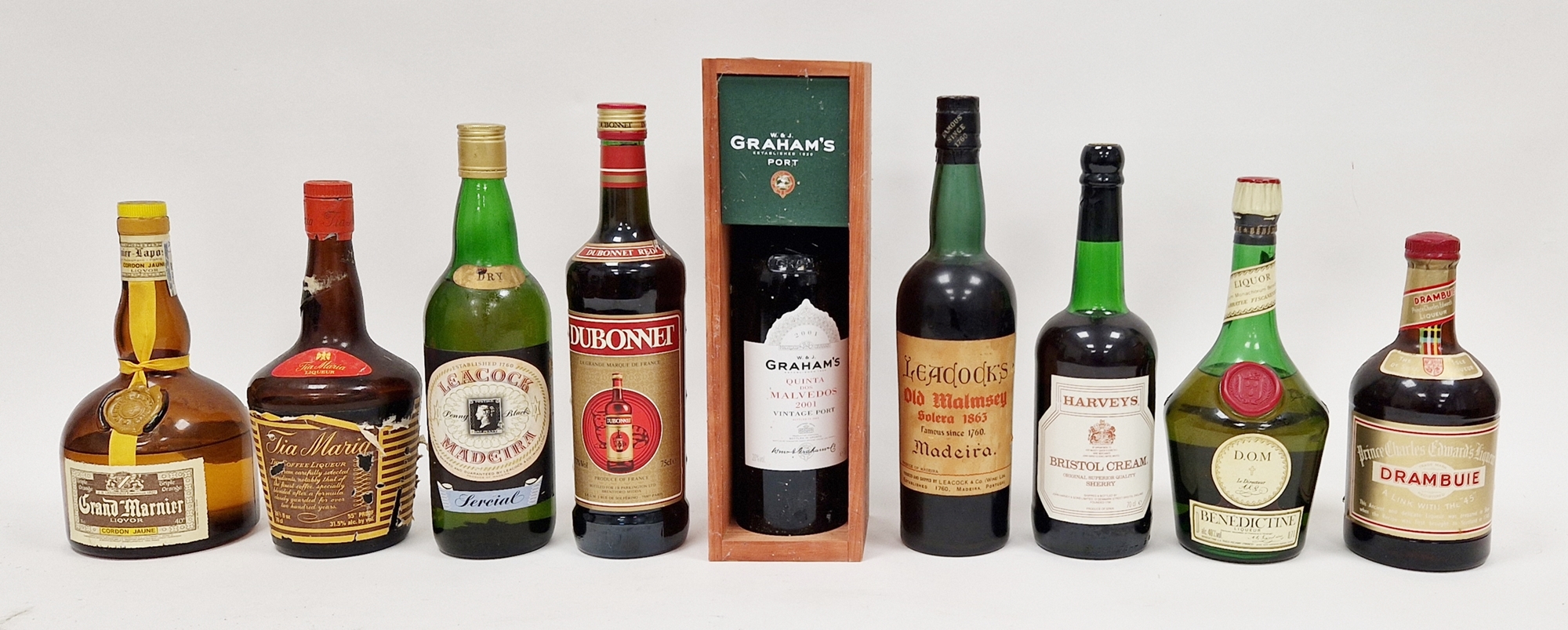 Mixed collection of fortified wines and liqueurs including a bottle of Graham's Quinta dos
