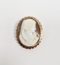 LOT WITHDRAWN Victorian gold-coloured metal cameo locket brooch, carved with portrait of Mary