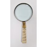 Late 19th century mammoth tooth handled brass mounted magnifying glass, with tapering rectangular