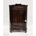 Victorian rosewood corner cupboard with inlaid brass stringing, single door opening to reveal two