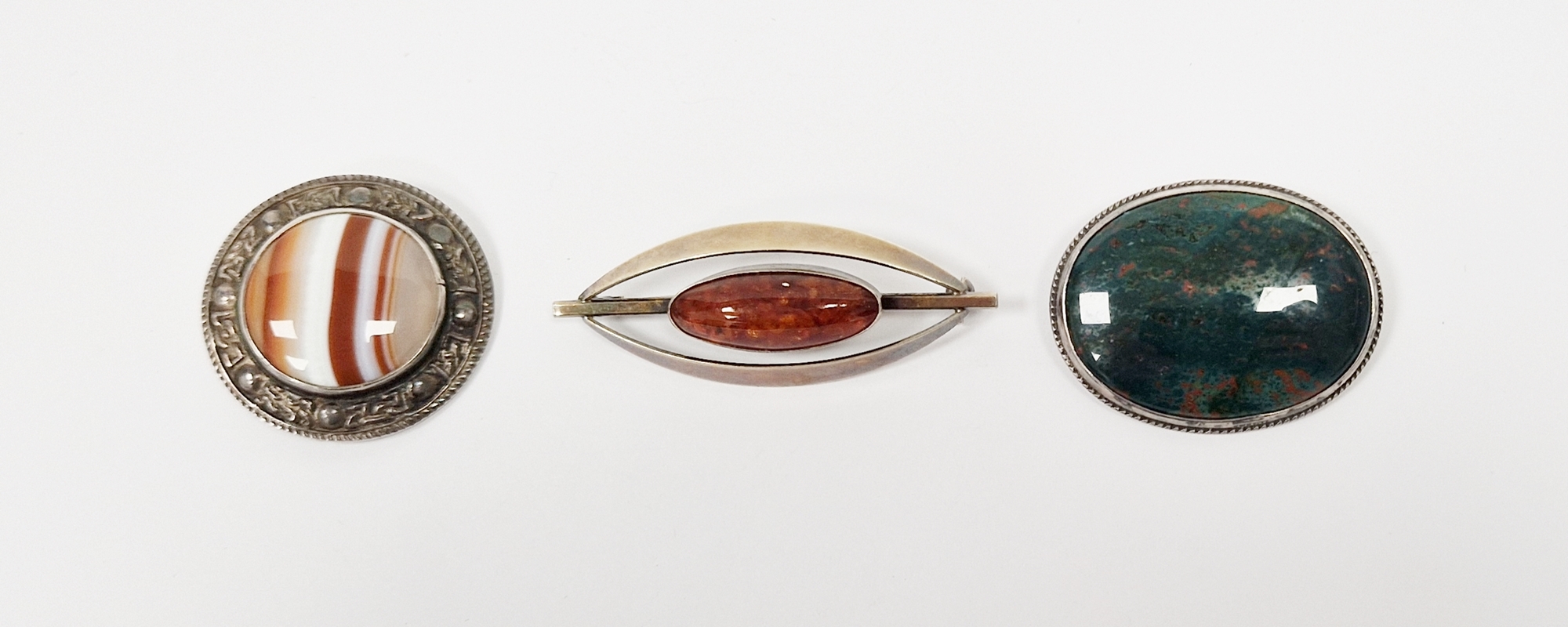 Victorian silver and bloodstone brooch set large oval polished stone, a Scottish silver and banded