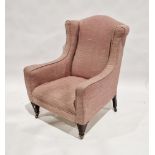 Wing back armchair in Georgian style, on wooden legs with castors, 100cm high