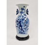 Chinese porcelain blue and white tapering oviform vase on wooden stand, 19th century, the vase