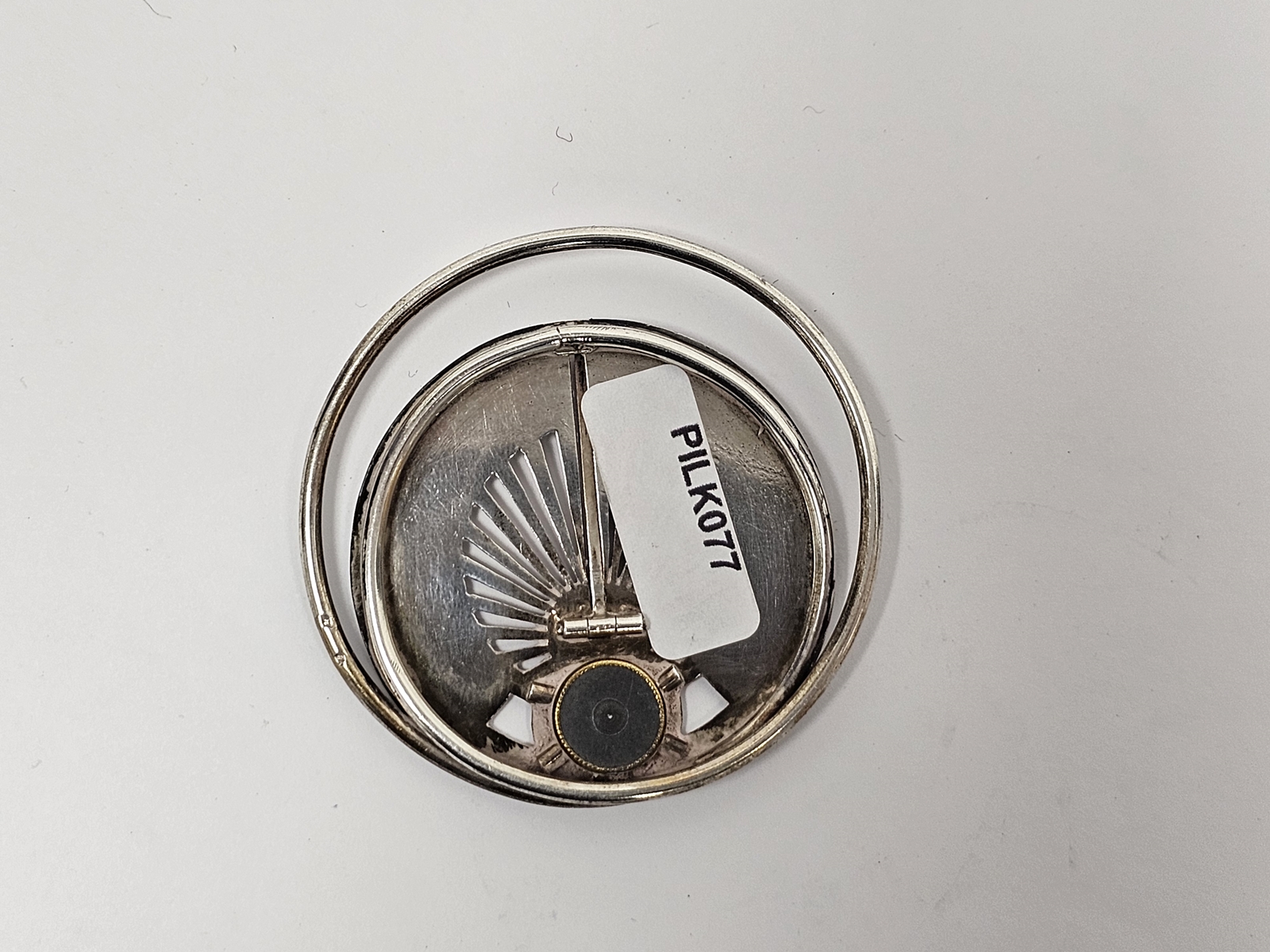 French silver-coloured bookmark, of circular form modelled as a sundial, with hinged gnomon, - Image 2 of 2