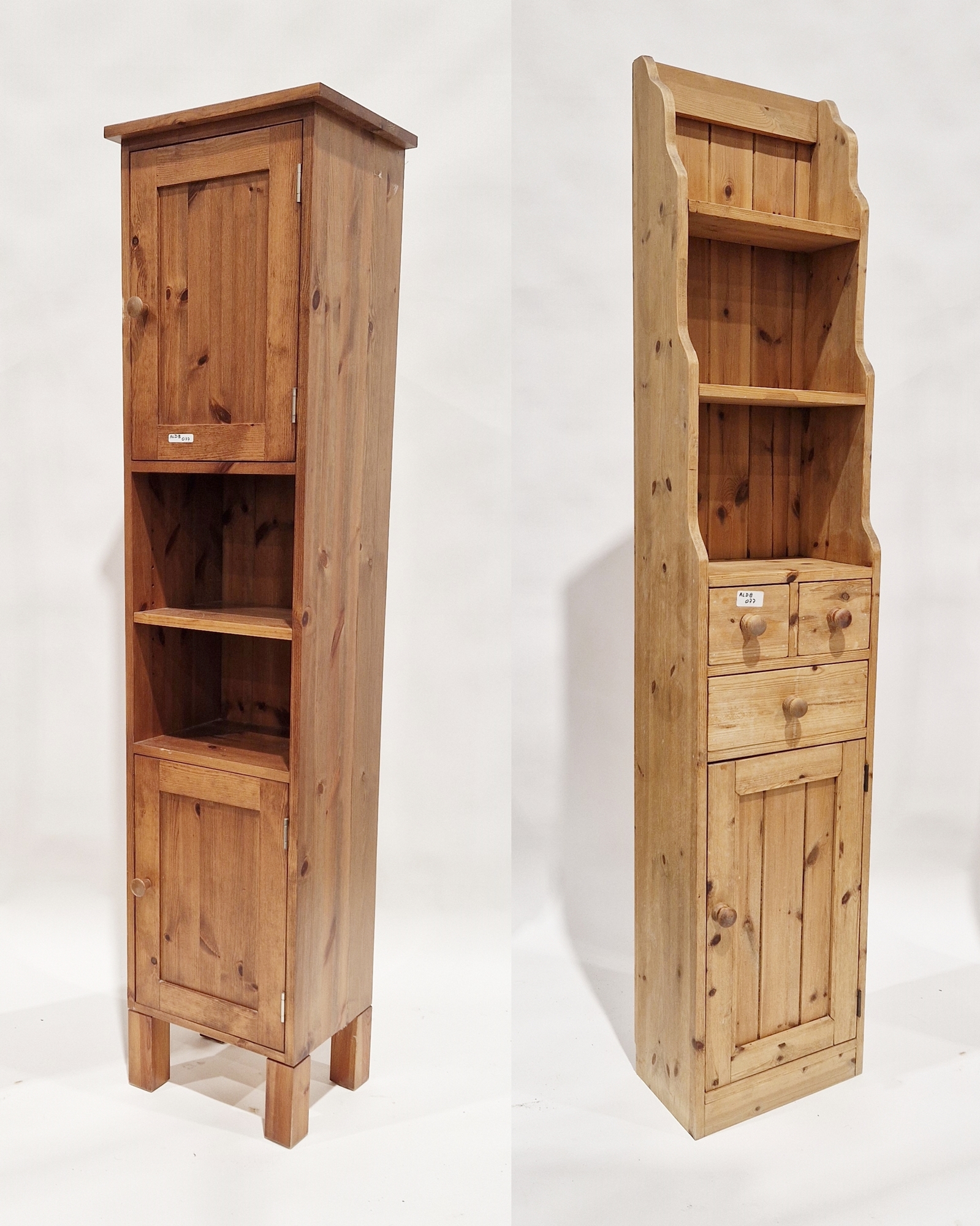 Pine storage unit having three shelves, three drawers and a single door cupboard, 178cm high x