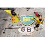 Collection of vintage motoring items to include a metal BP sign painted green and yellow, a Shell