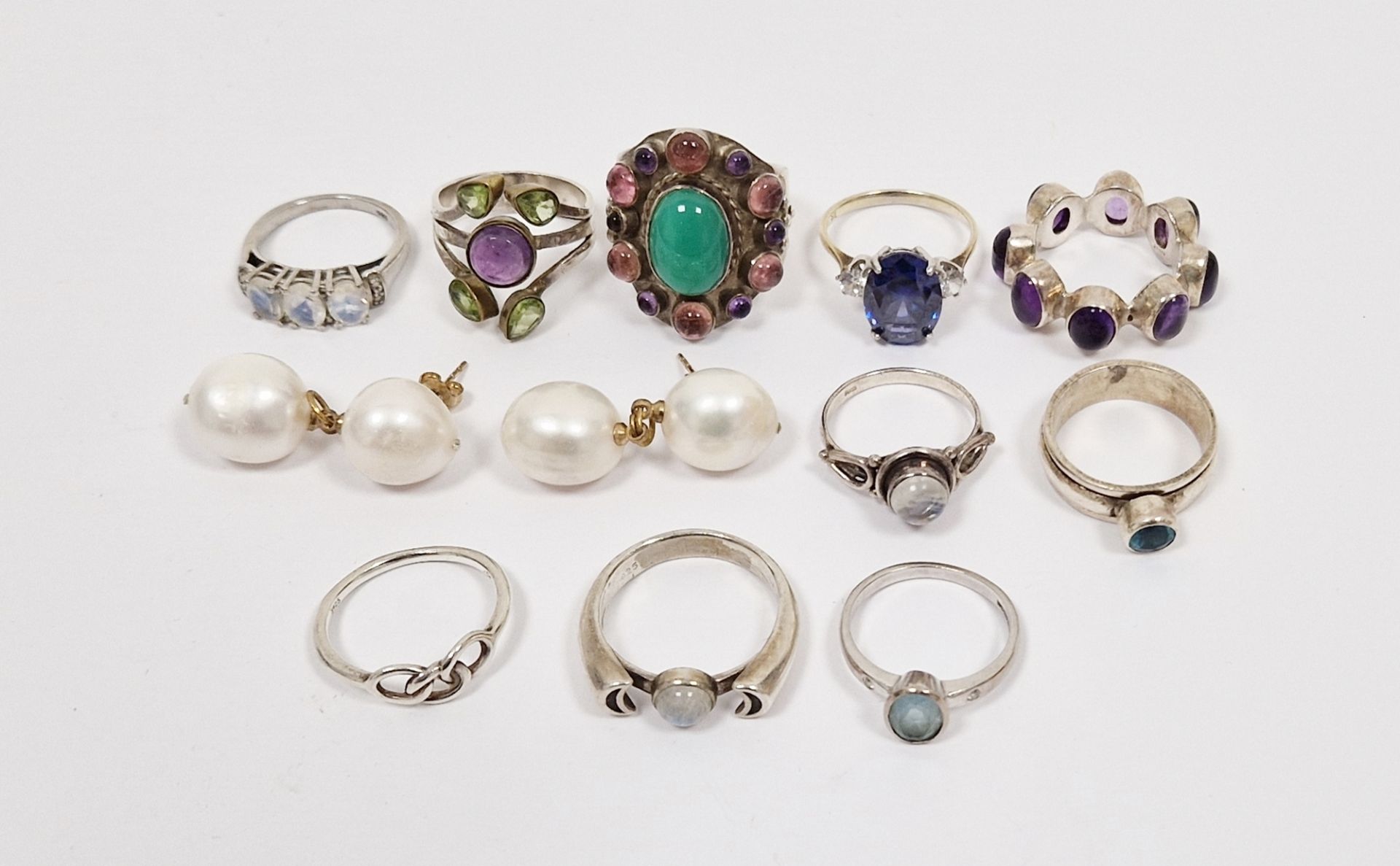 Quantity modern silver stone set rings to include amethyst-coloured stones and others