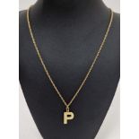 18ct gold Prince of Wales pattern chain necklace, 6g approx. and a gold-coloured metal initial P