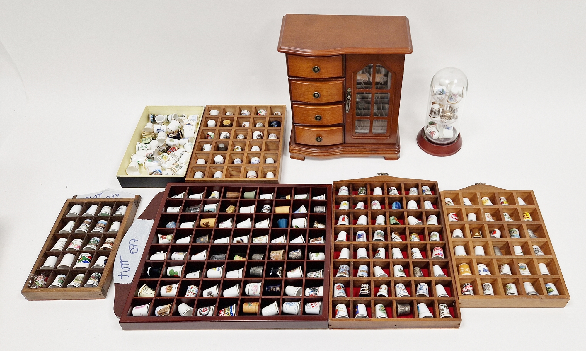A collection of ceramic thimbles  within various fitted display cases, a wood jewellery box, - Image 2 of 2