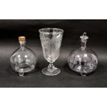 Two late 19th/early 20th century blown glass fly/insect catchers and an early 20th century glass