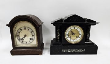 Arched dial and cased mahogany mantel clock, silvered chapter ring with roman numerals, the brass