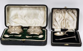 Pair of Edwardian silver salts, Birmingham 1904, of shaped oval design with floral and scroll