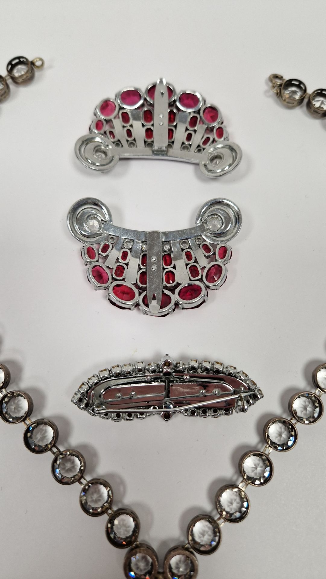 Pair Art Deco red and white paste stone clips, crescent design, antique silver-coloured metal and - Image 3 of 3