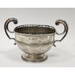 Silver two-handled rose bowl, circular with free scroll handles, double moulding to the body, on