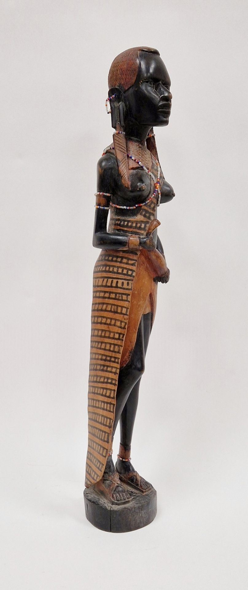 Carved wooden figure of an African girl with beaded decoration to her ankles and chest, 62cm high - Image 4 of 4