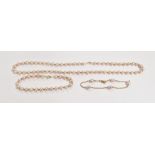 String of pale pink freshwater pearls with matching bracelet and a pearl and gold bracelet marked