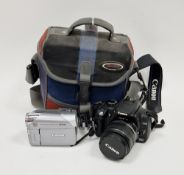 Canon EOS SLR digital camera and a Canon MVX450 digital video camcorder in bag