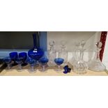 Collection of blue tinted and cut glassware, including: a blue ewer on lobed spirally moulded stem