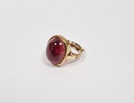 9ct gold and cabochon garnet ring set single oval polished stone, ring size 'N' Condition Report