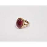 9ct gold and cabochon garnet ring set single oval polished stone, ring size 'N' Condition Report