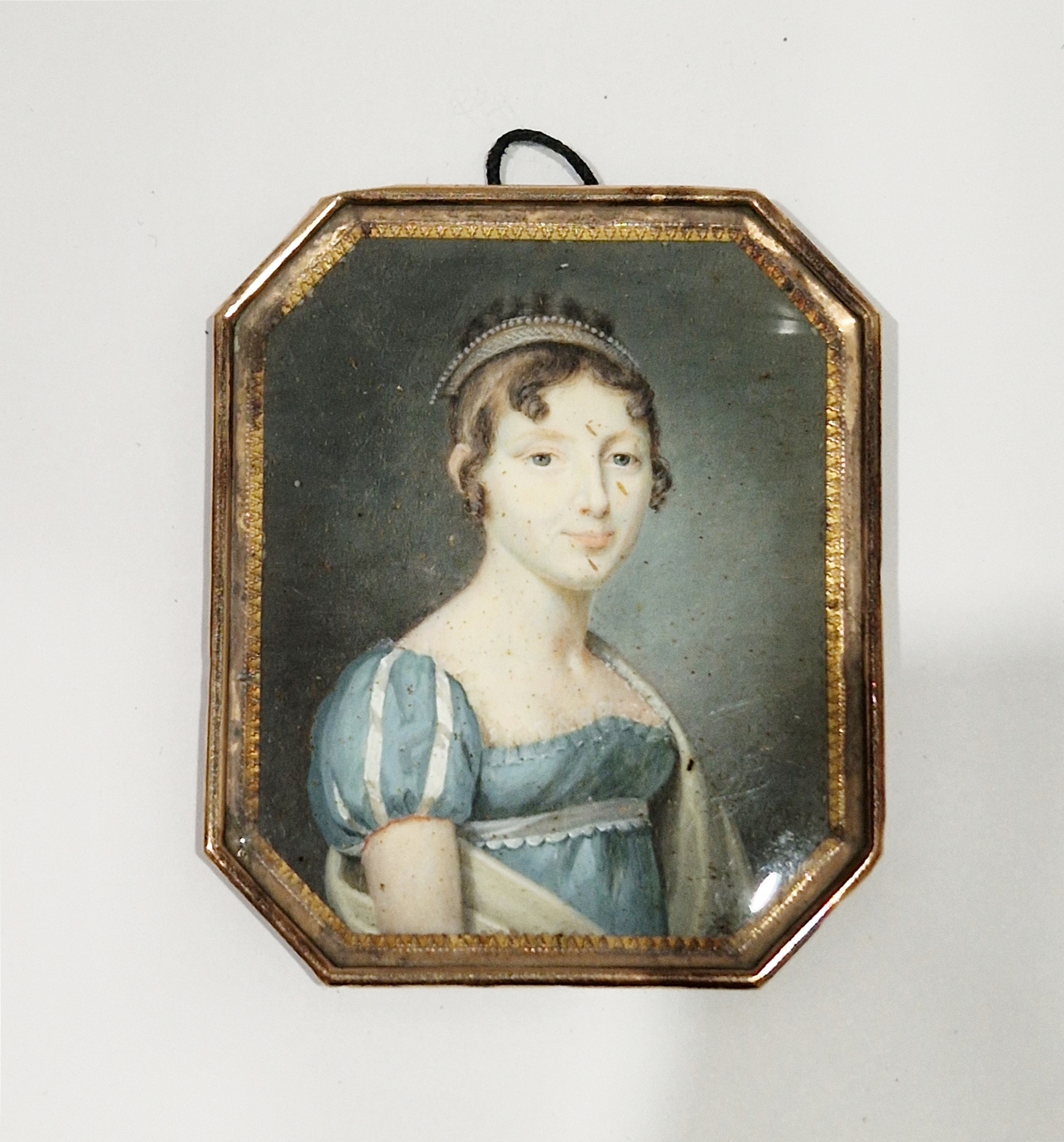 Late 18th/early 19th Century French School Portrait miniature of a lady in watercolour on ivory In