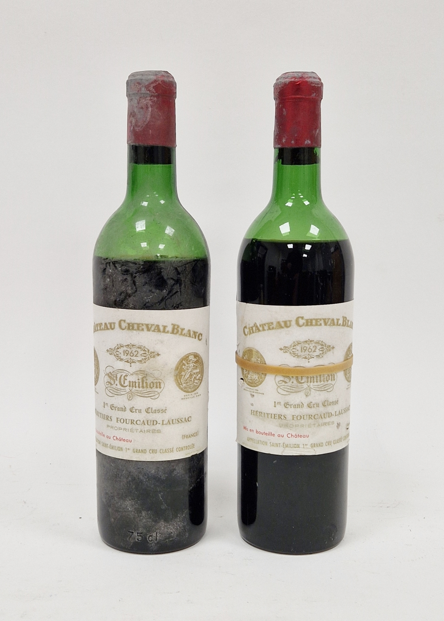 Two bottles of Chateau Cheval Blanc St Emillion Grand Cru classe 1962 (mid and very low shoulder) (