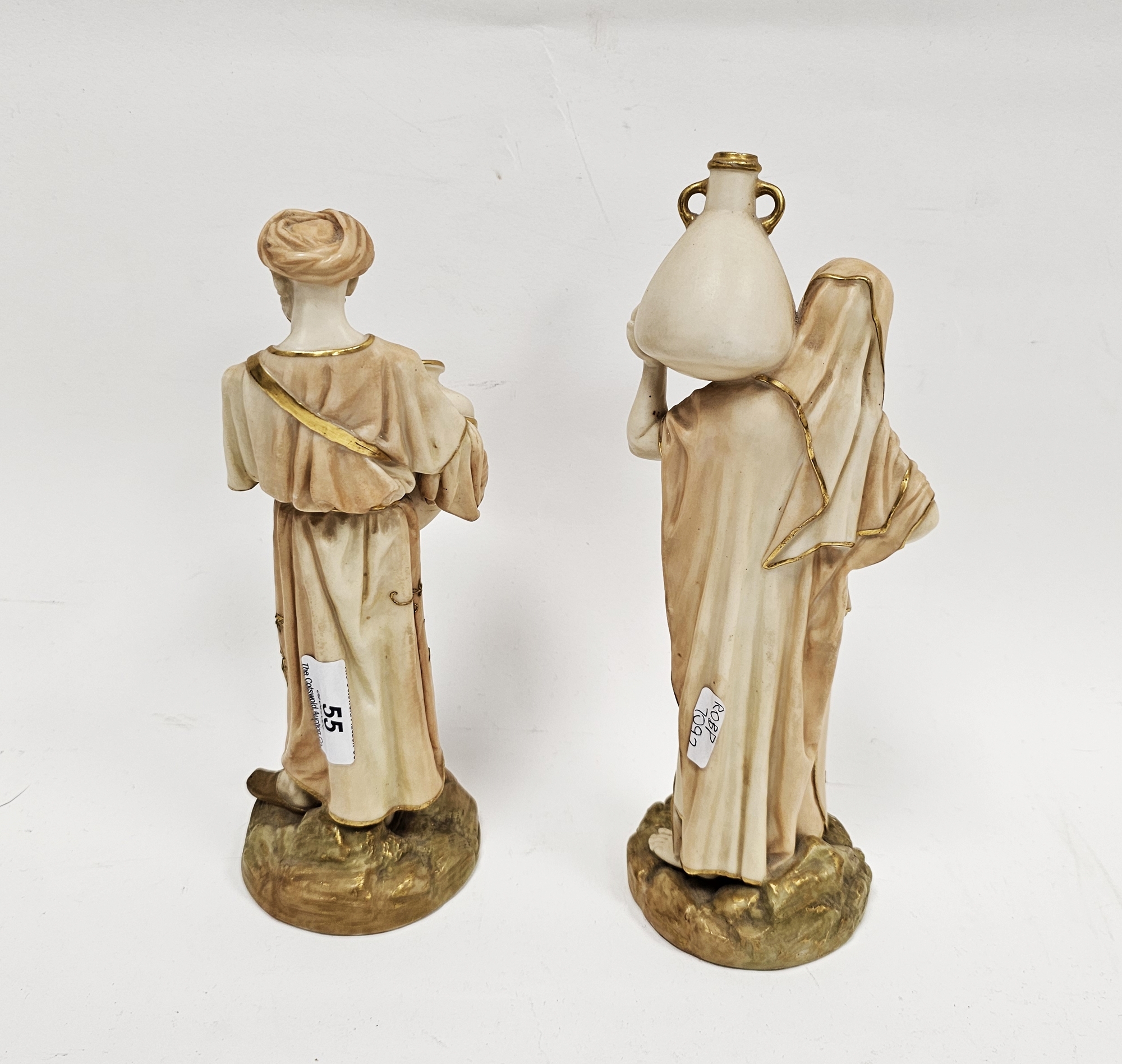 Late 19th century pair of Royal Worcester blush ivory figures of Middle Eastern water carriers, - Image 2 of 7