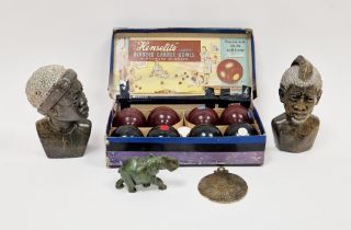 Two carved marble heads of an African man and woman, a carved jadeite elephant, a replica medal of