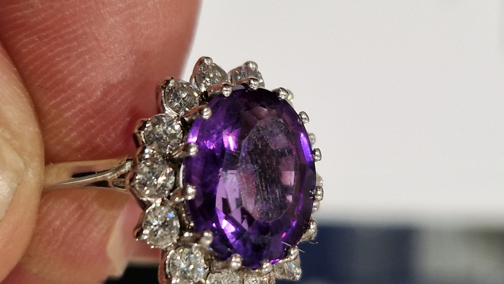 18ct gold, amethyst and diamond cluster ring, the oval amethyst 11.9mm x 9.9mm x 6.4mm deep - Image 7 of 10