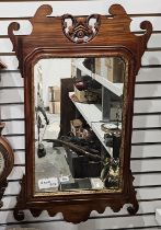 Georgian style carved mahogany and parcel-gilt rectangular wall mirror, with pierced shield-shaped