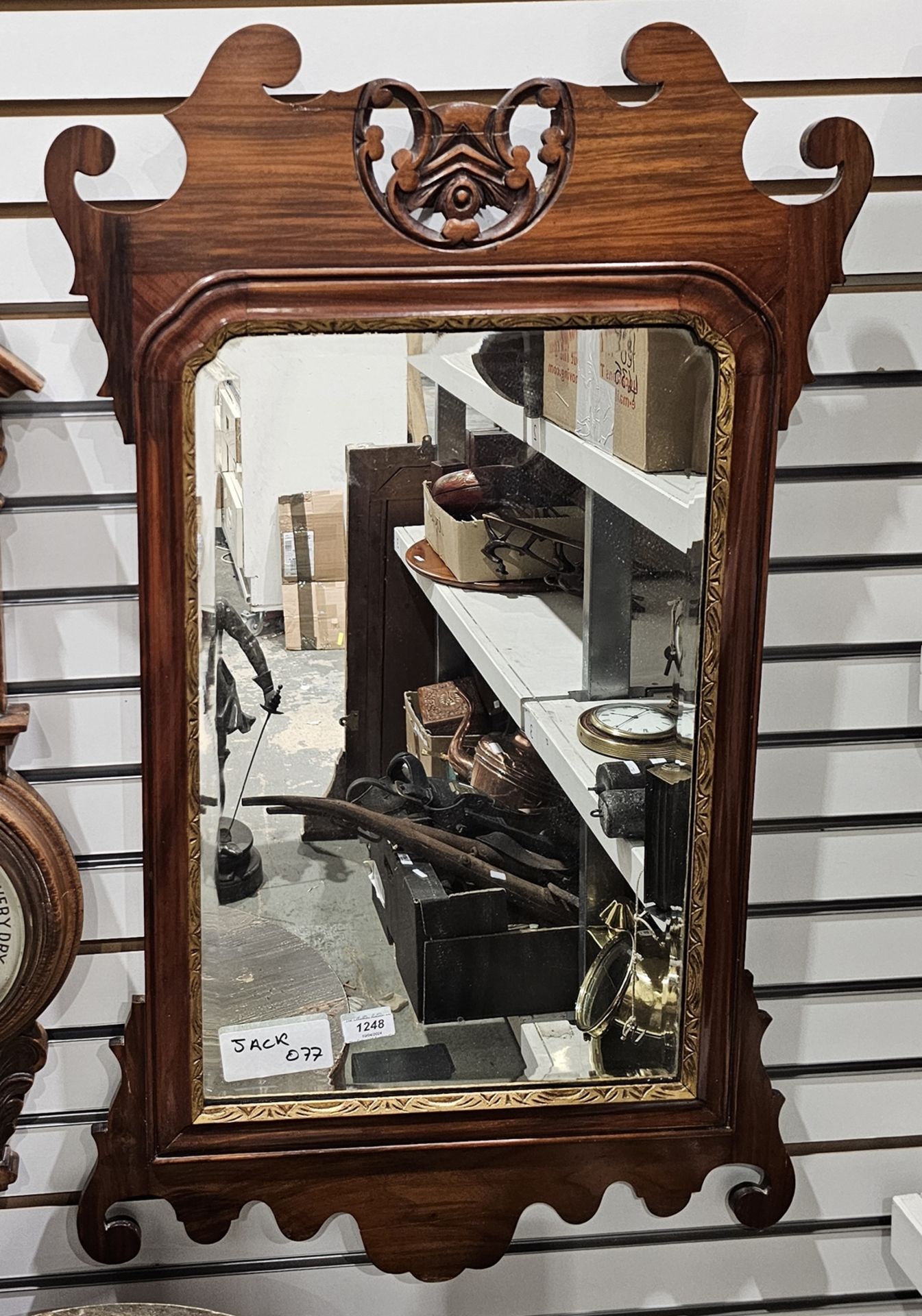 Georgian style carved mahogany and parcel-gilt rectangular wall mirror, with pierced shield-shaped