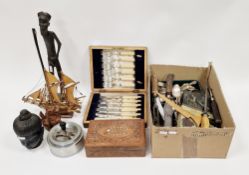 Various antler-handled carvers, a leather and wood carved model of a sailing ship, assorted silver