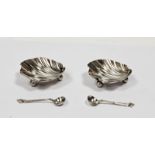 Pair late Victorian silver salt cellars, each shell-shaped and raised on three ball feet and a