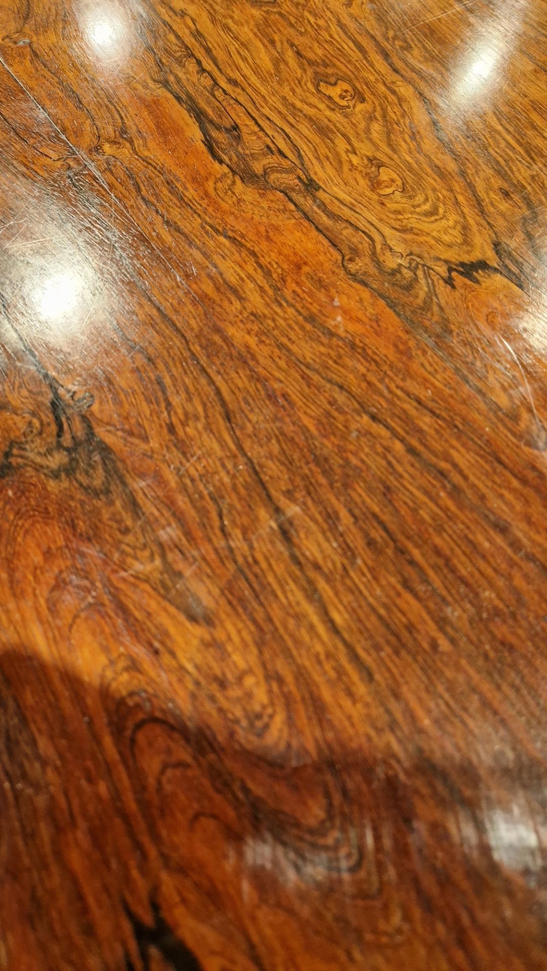 Large early Victorian rosewood tilt-top dining table of circular form, with carved floral central - Image 10 of 30