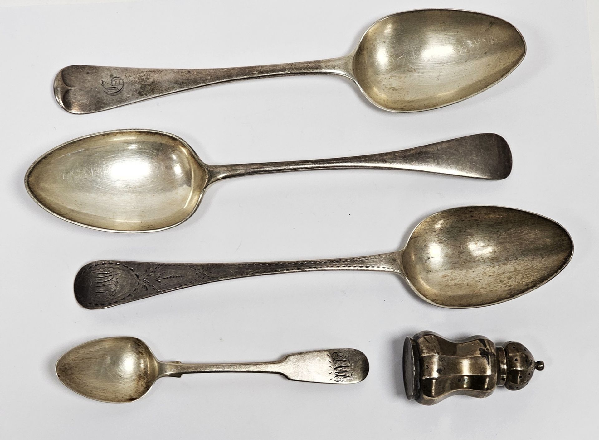 A George III silver tablespoon, bright cut engraved, Peter & Jonathan Bateman, London 1810;